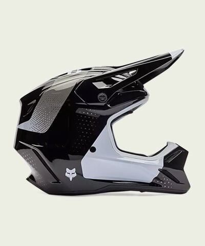 green and blue v3 rs helmet on green background