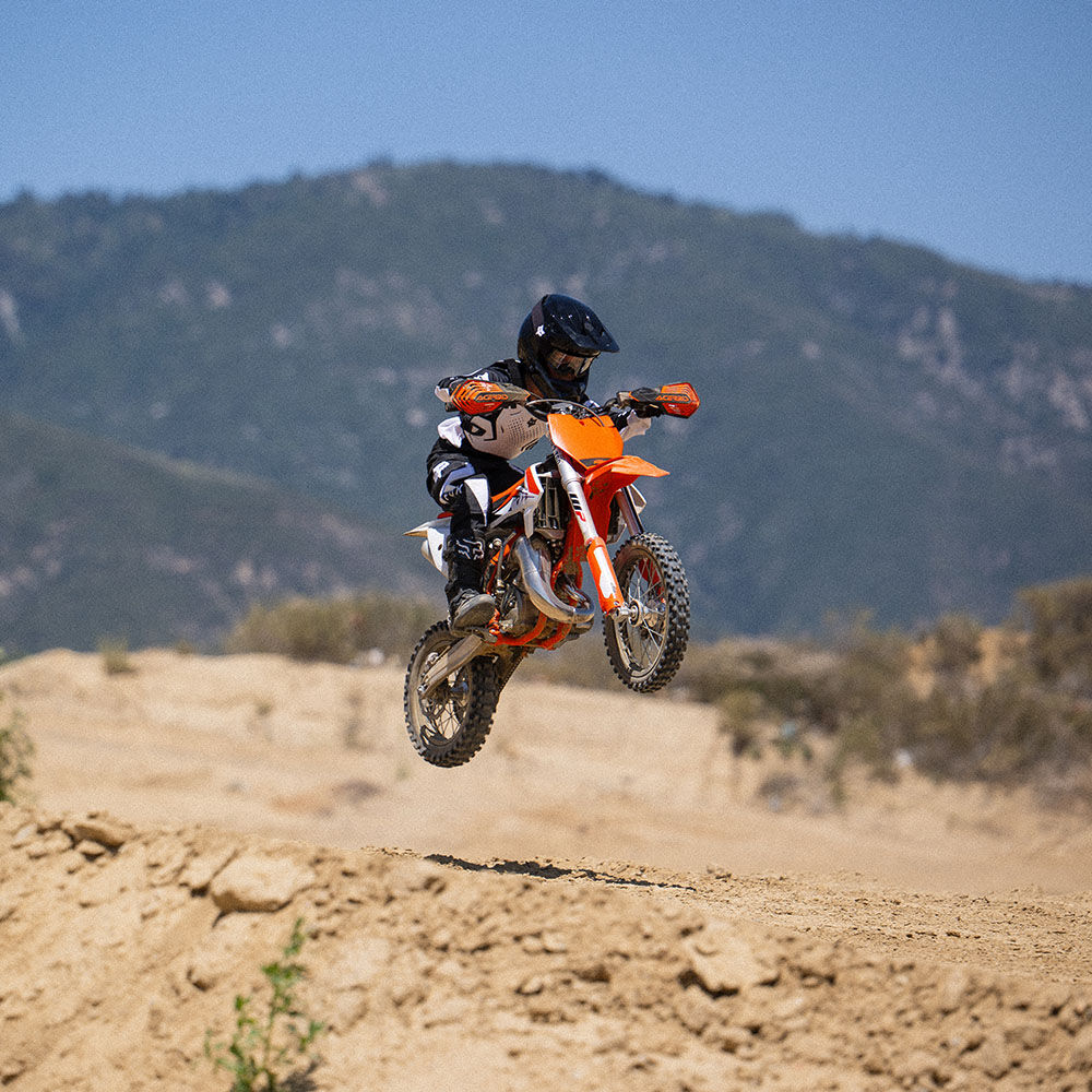 Kid in air wearing 180 gear