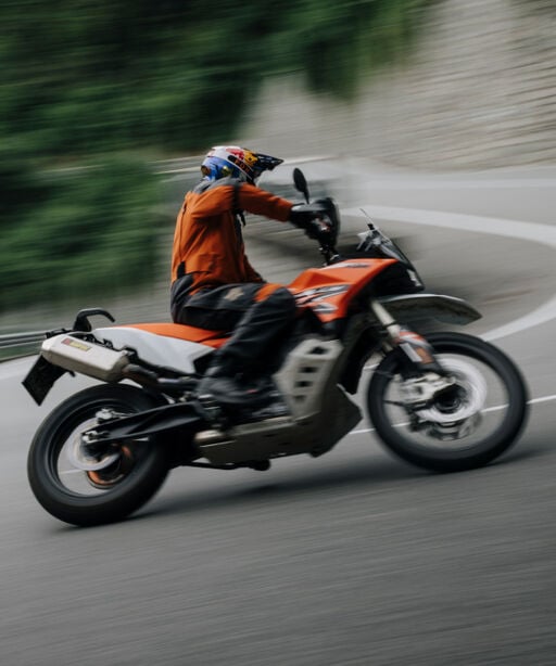 Person in a moto using Fox ADV gear