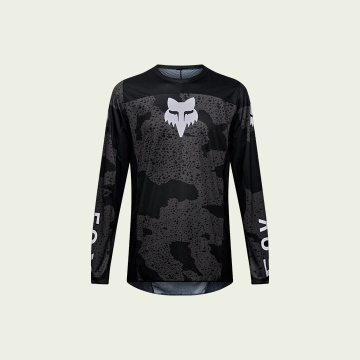 black jersey on green background